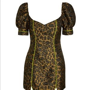 Fitted Leopard Mini Dress features contrast neon green piping. Size small